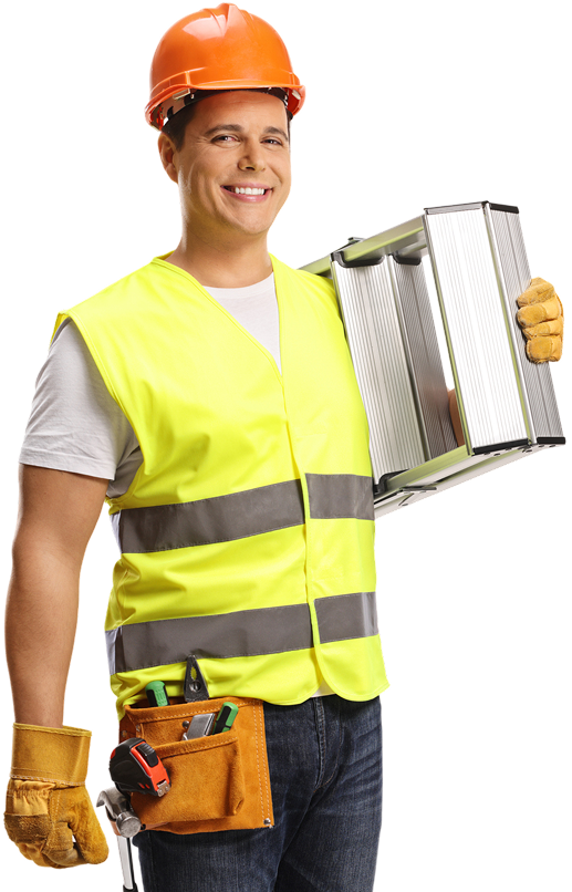 Construction worker holding metal object, smiling.
